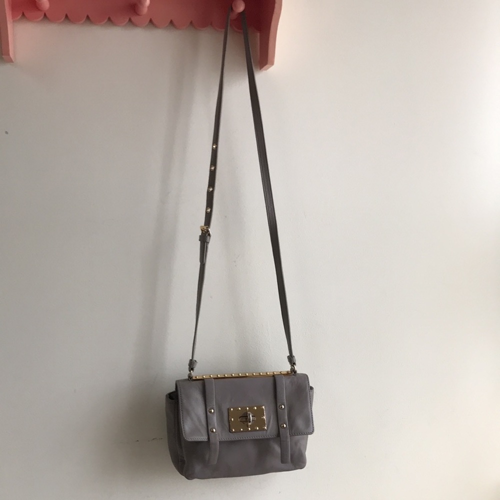 Badgley Mischka crossbody purse puce leather gold tone turn clasp. Holds a lot